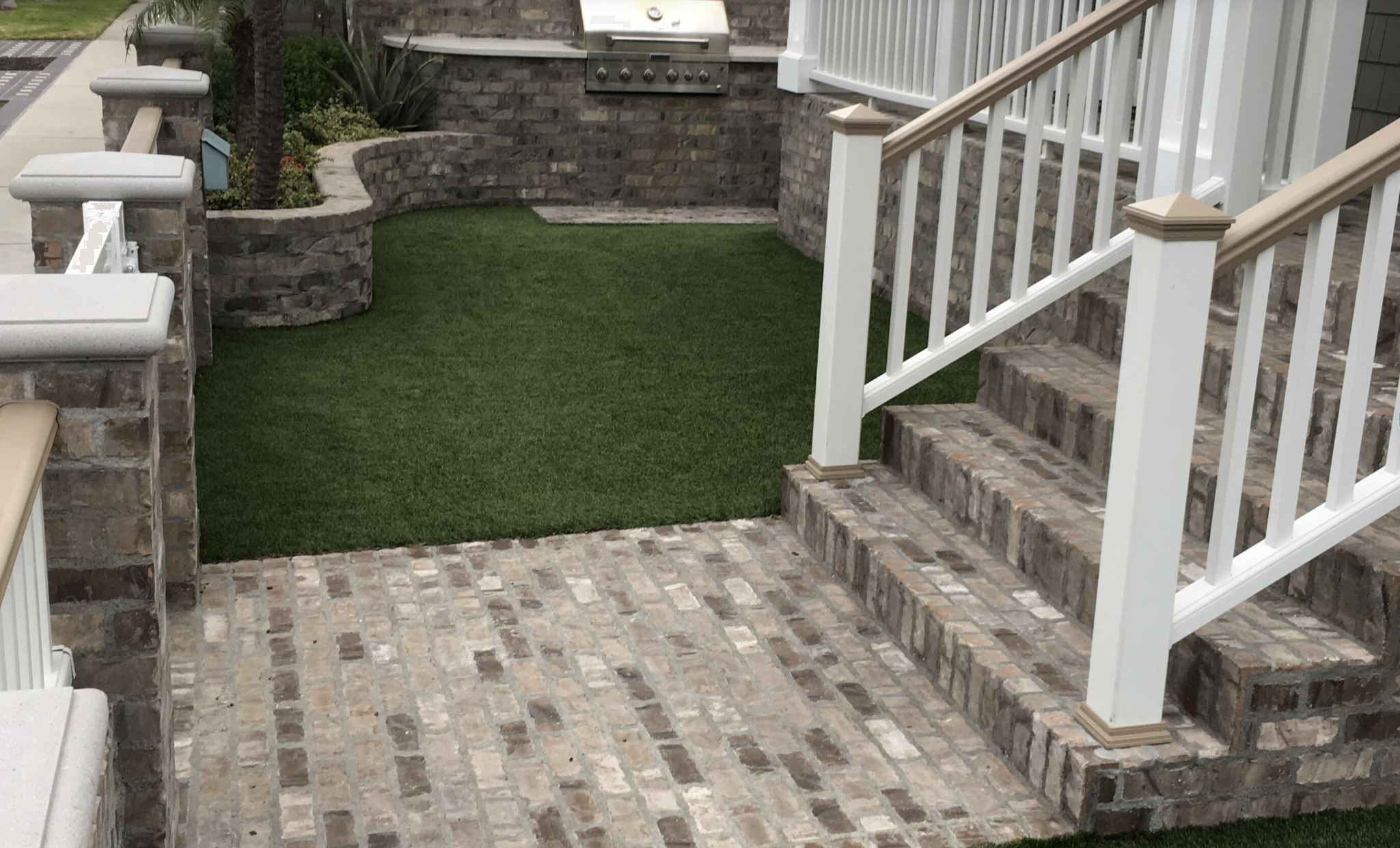 Front yard with stainless steel grill